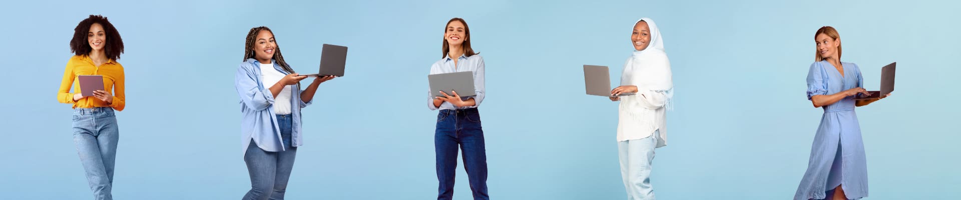 group-multiracial-young-women-study-remotely-with-laptop-computers
